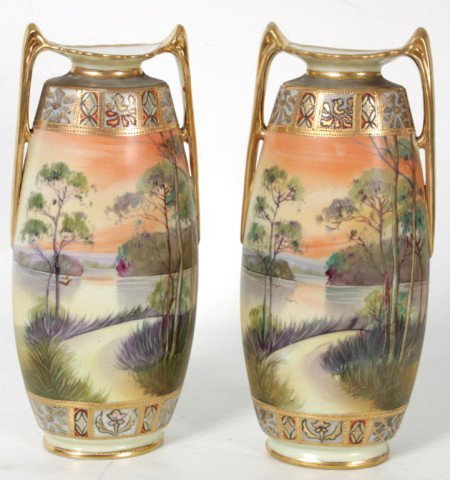 Pr. Nippon Scenic Vases: Pr. Nippon Scenic Vases. Matching scenic hand decorated vases with gold and enamel trim and borders with long elegant handles. Signed on the base with green Nippon mark. In excellent condition. 10.25 