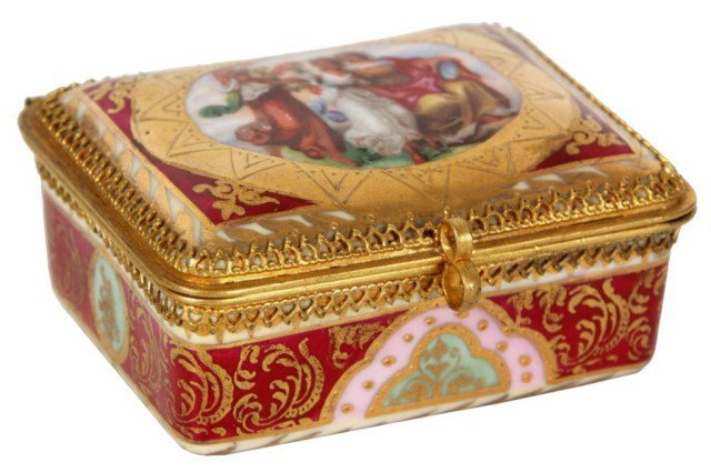 Royal Vienna Porcelain Ring Box: Royal Vienna Porcelain Ring Box. Ruby red box with gilt and enamel borders, genre scenes painted on the lid and the interior, fine gilt metal collar and hinge. 1.5 in. High x 3.25 x 3.