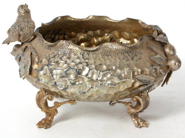 Reed & Barton Silver Plated Centerbowl: Reed & Barton Silver Plated Center Bowl. Hand hammered design on lion's claw feet mounted on the sides with leaves and fruit with a small figural bird. Singed on the foot - 525, Pat Applied, Reed & Ba