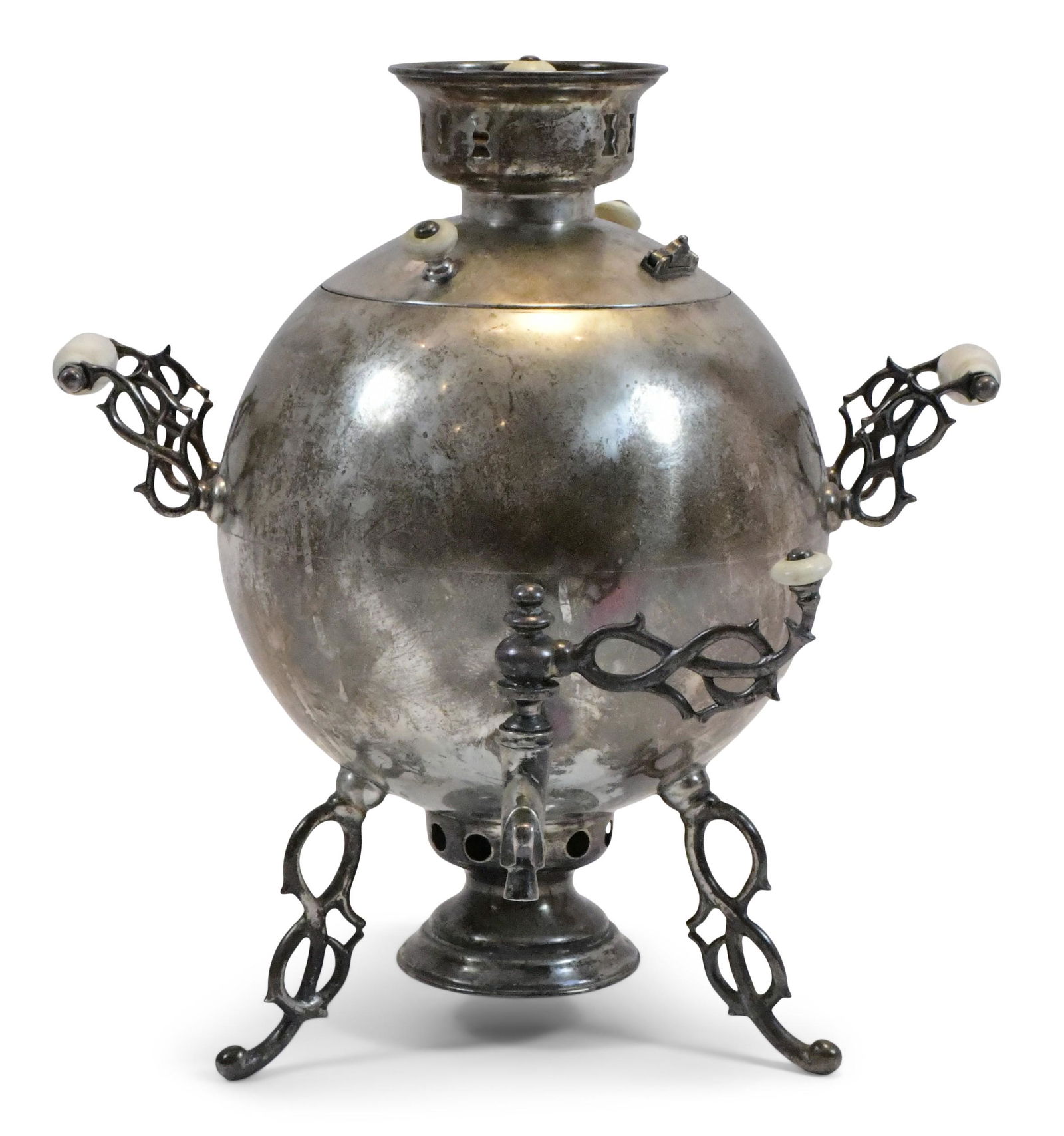 Russian Silver Samovar, Grachev, St. Petersburg: Russian Silver Samovar, Grachev, St. Petersburg circa 1867 the spherical body with pierced scrolling feet, signed with maker's mark and stamped "A.C. 1867, 84" 15 1/2 in. high 115.20 troy ounces (tota