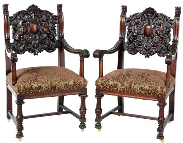 Set of 10 Horner Carved Oak Dining Chairs: 10 Carved Oak Dining Chairs Attr: R.J. Horner. Fancy carved backs centered with a shield and a pair of sphynx, figural heads at the top of the seat posts. 2 arm chairs an 8 side chairs in excellent re