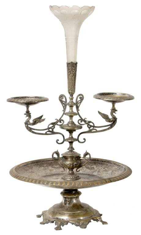 Victorian Silver Plated Epergne: Victorian Silver Plated Epergne. A compote base on 4 feet topped with a 13 in. dia. bowl with an engraved border; moving up from the bowl is a long stem with a cut and frosted glass bud vase fitted in