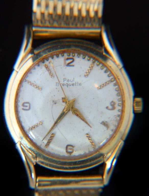 Paul Breguette Automatic Watch: 14K Gold Signed Paul Breguette Automatic Mans Wristwatch. Dial measures approximately 22mm, has applied gold hour markers, hour and minute hand and sweep seconds hand; 17 jewel automatic movement bala