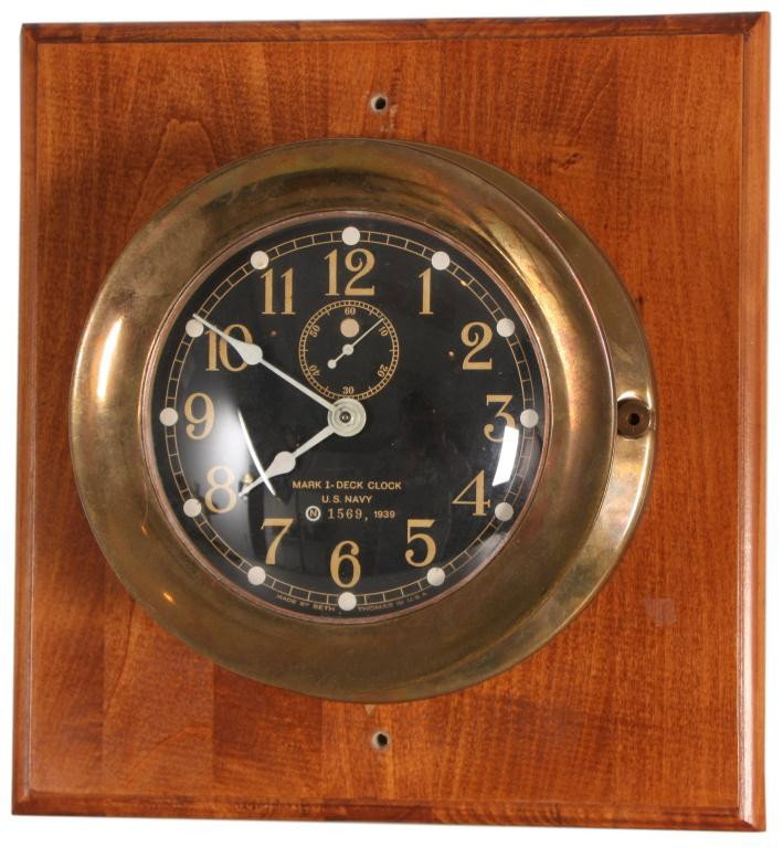 Seth Thomas Mark 1 Deck Clock: Seth Thomas Mark 1 Naval Deck Clock. 6 in. Painted metal dial with incised hour numerals, sub seconds dial, white spade hands; dial reads Mark I - Deck Clock, U.S. Navy 1569, 1939 - Made by Seth Thoma