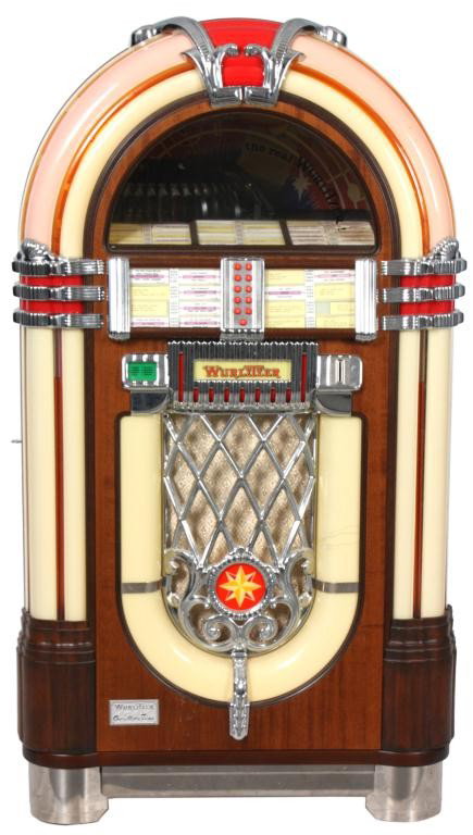 Reproduction Whurlitzer Model 820 Jukebox: Reproduction Whurlitzer Model 820 Jukebox. Dome top with walnut sides, colorful plastic framing on the front of the door, chrome style trim and bubbling tubes. In excellent working condition, 25 cent 