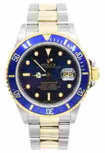 Rolex Two-Tone Submariner, Reference 16803, 18K Gold & Stainless Steel Wristwatch, Circa 1988: Rolex Two-Tone Submariner, Reference 16803, 18K Gold & Stainless Steel Wristwatch, Circa 1988Case: 18K Gold, Stainless SteelCase Diameter: 40mmDial: BlueReference Number: 6694Serial Number: R393371Mov