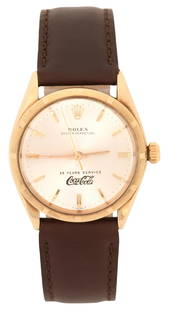 Rolex 14K Gold Oyster Perpetual "25 Years Service / Coca-Cola" Wristwatch, Reference 1005, Circa: Rolex 14K Gold Oyster Perpetual "25 Years Service, Coca-Cola" Wristwatch, Reference 1005, Circa 1966Case: 14K GoldCase Diameter: 34mmReference/Model Number: 1005Movement: Automatic, 26 Jewel