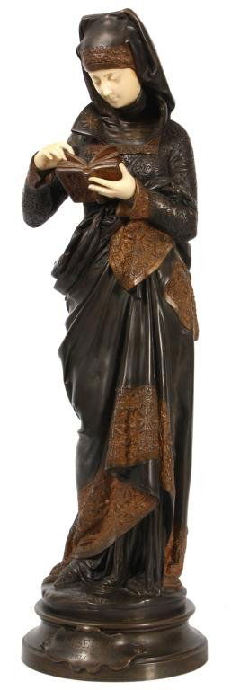 A. Carrier Belluse - La Liseuse: Albert Ernest Carrier Belluse (1824-1887) Bronze & Ivory Titled La Liseuse. A standing figure of a woman wearing a long gown and a habit on her head, she is reading a book. The bronze has a 2 tone pat
