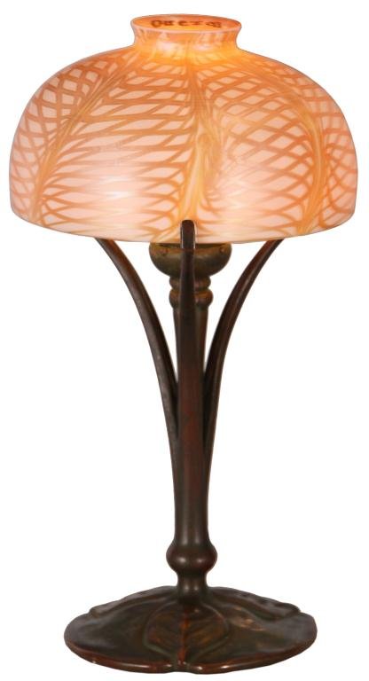 Tiffany & Quezal Desk Lamp: Tiffany & Quezal Desk Lamp. Tiffany Studios bronze leaf molded 3 arm base, has a single socket and nice patina; signed Tiffany Studios New York 425. Signed Quezal 7 in. domical damascened shade, has a