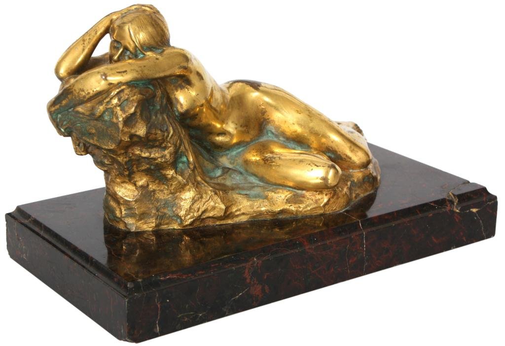 Hans Schuler Bronze of Girl: Hans K. Schuler (1874-1951) Bronze of Girl. Figural bronze of a reclining nude girl, she is shown leaning against a rock; has a nice dore bronze finish and is set on a marble base. Signed Schuler and 