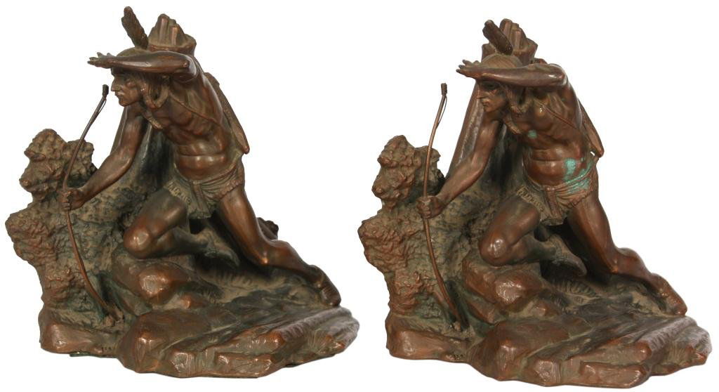 Pr. Jennings Indian Bookends: Pr. Jennings Bros. Indian Bookends. Figural bronze clad Indian stands beside a bolder, in his right hand he holds a bow, his left hand holds the collar of his loyal hunting dog. 7.5 in. high x 7.5 in.
