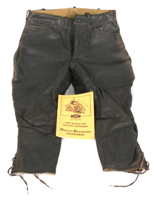 Vintage Harley Davidson Riding Pants: Vintage Harley Davidson Riding Pants. Labeled in the 1931 Spring/Summer Catalog as Leather Breeches, Code: 11068-X. These heavy leather pants are made of black horsehide leather with a khaki cloth lin