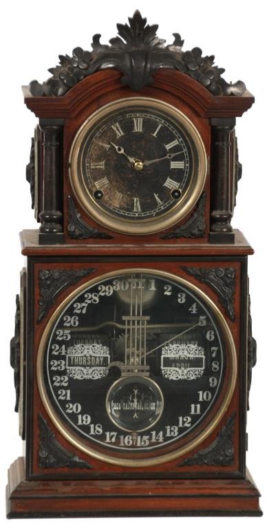 Ithaca 3 1-2 Parlor Model Mantle Clock: Ithaca 3 1-2 Parlor Model Mantle Clock. Has pierced spade silvered hands, black 4 in. paper dial with silver Roman numerals; glass 31 day calendar dial with silver Arabic numerals, fancy decoration an