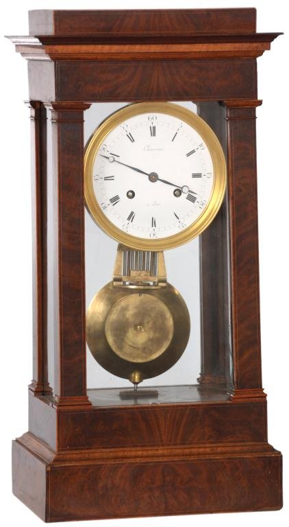 English Mahogany Table Regulator: English Mahogany Table Regulator. 6 in. Porcelain dial has black Roman hour numerals and Arabic 5 minute markers, blued open moon hands and brass bezel, dial signed Chauveau, Paris. Has a quality roun