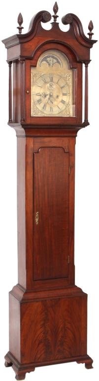 John Wood Mahogany Tall Case Clock: John Wood Mahogany Tall Case Clock. Brass dial has 10 in. chapter ring with black incised Roman hour numerals and Arabic 5 minute markers, signed John Wood, Philadelphia, sub seconds dial and 31 day s