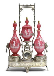 Reed & Barton Aesthetic Movement Silverplate & "Mary Gregory" Glass Figural Dresser Set: Reed & Barton Aesthetic Movement Silverplate & "Mary Gregory" Glass Figural Dresser Setearly 20th centurydecorated with lion heads, dog heads, foliate, flowers and pink cased glass dresser b