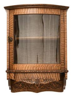 American Carved Oak Wall Cabinet: American Carved Oak Wall Cabinetcirca 190025 x 18 1/2 x 13 inchesProvenance: Property from a Texas Estate