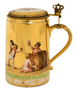 Royal Vienna Style Porcelain & Gilt Brass Stein: Royal Vienna Style Porcelain & Gilt Brass Steincirca 1900decorated with children holding drinks and flowers, marked with blue beehive)6 1/4 x 4 x 5 1/2 inchesProvenance: Private Collection, Branchvill