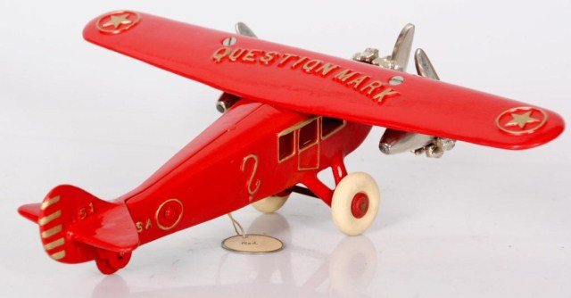 Dent Hardware Co. Airplane Toy: Dent Hardware Co. Airplane Toy. Sample toy number 493; has red paint with raised gilt lettering, titled Question Mark, has silvered motors and propellers. In very good condition, with excellent origin