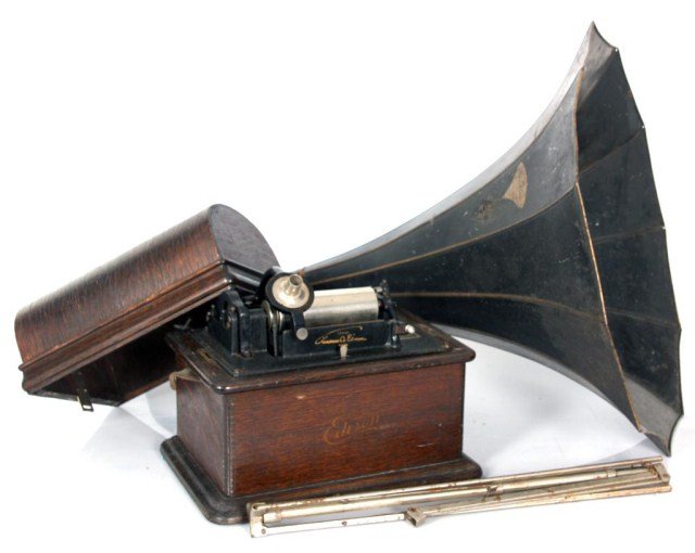 Thomas Edison Standard Phonograph: Thomas Edison Standard Phonograph. Oak case with dome top and gold stenciling, in original finish. Metal horn with Thomas Edison Home decal and has support arm. Has a good spring and appears in workin