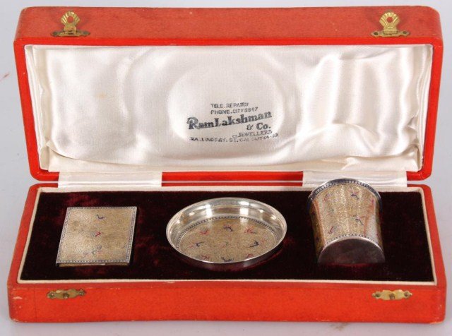 Indian Silver & Enamel Smokers Set: Indian Silver & Enamel Smokers Set. Finely tooled silver pieces with gilt wash, blue & red enamel embellishments; includes matchbox holder, ashtray & cup. No silver hallmarks, each piece is in good co