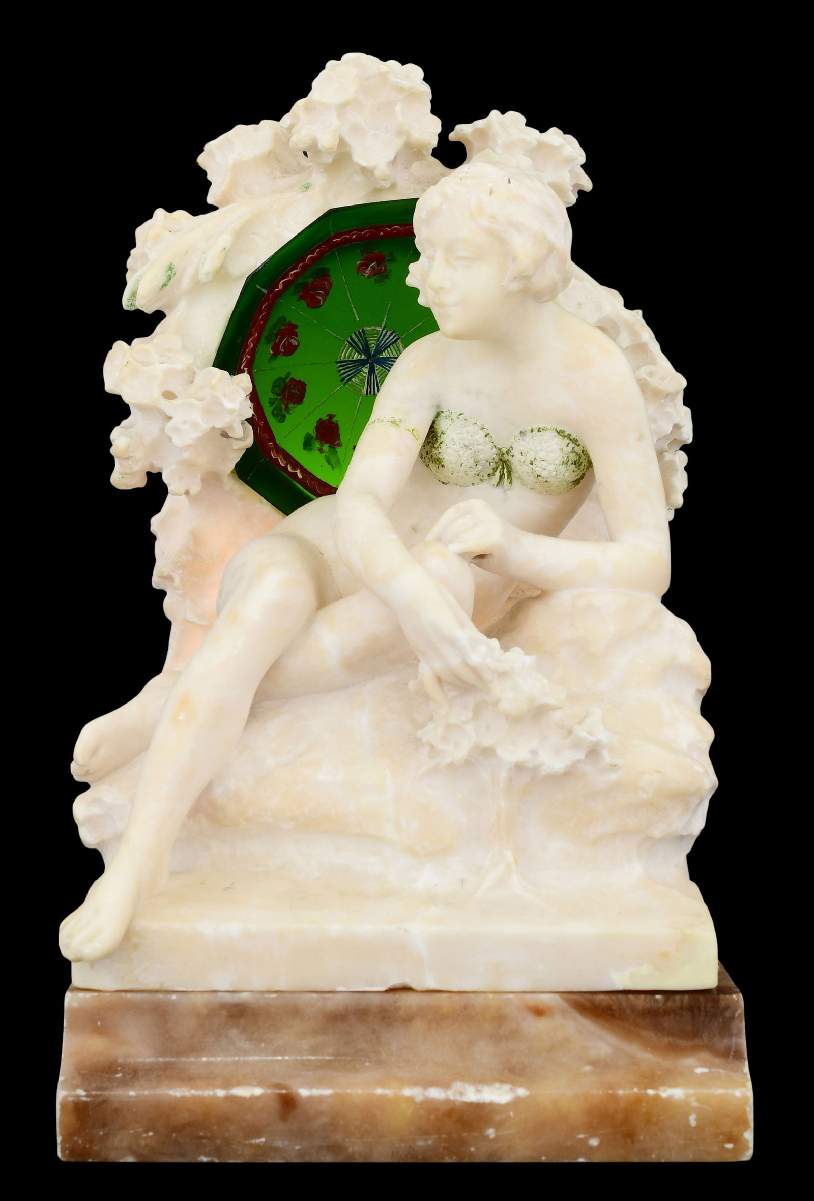 Italian Alabaster Sculptural Lamp: Italian Alabaster Sculptural Lamplate 19th centurythe lamp carved with a reclined woman surrounded with flowers, inscribed "Movole in Italy, Pozzi"12 3/4 x 10 1/2 x 7 1/2 inchesProvenance: The Estate