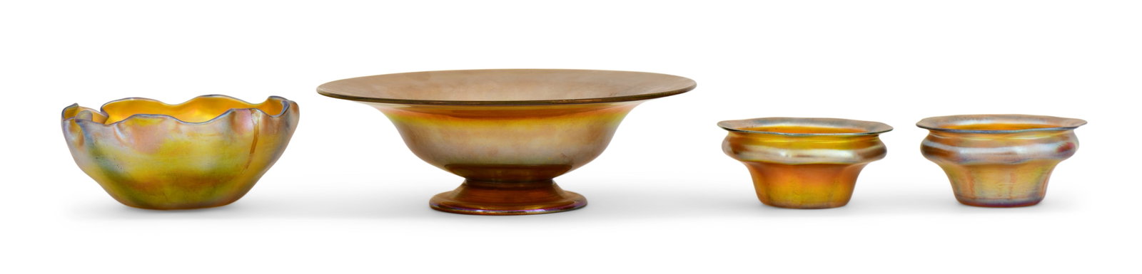 Four Tiffany Studios Favrile Glass Bowls: Tiffany Studios Four Bowls circa 1920 favrile glass each engraved on the underside 3 x 9 1/2 inches (largest) Provenance: Private Collection, Pittsburgh, Pennsylvania Other Notes: Fontaine's Auction