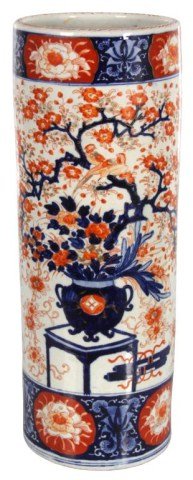 Japanese Imari Umbrella Stand: Japanese Imari Umbrella Stand. Decorated in white and blue with orange. The front and back with a planter on a table wit a large tree growing outwards with flowers and branches growing to the top and 