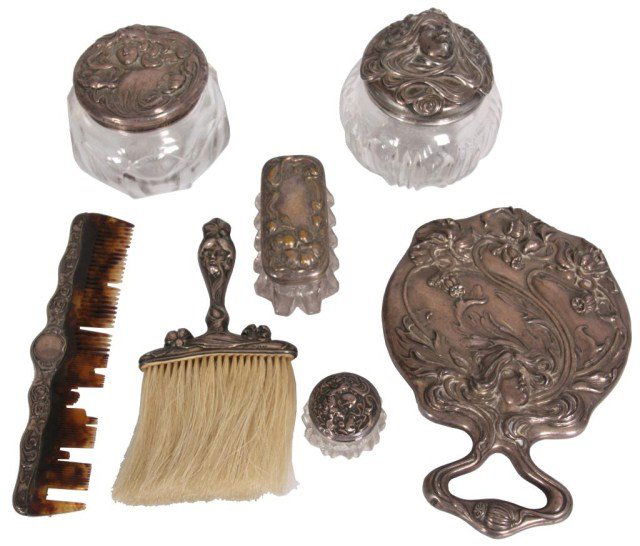 7 Pc. Silver & Glass Dresser Set: 7 Pc. Silver & Glass Dresser Set. 5 Pc. sterling silver: the hand mirror and brush with nouveau lady design and signed with Wm. B. Kerr hallmark, plus a sterling silver comb with faux tortoise shell t