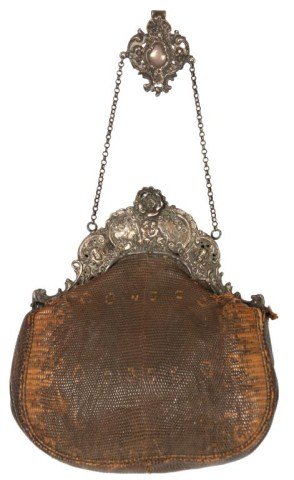 Silver & Snake Skin Purse: Silver & Snake Skin Purse. Fancy repousse silver crest with floral latch, chain and hanger, on a fine snake skin bag, in overall good condition with expected wear. Signed with Hanau Pseudo-Marks on th