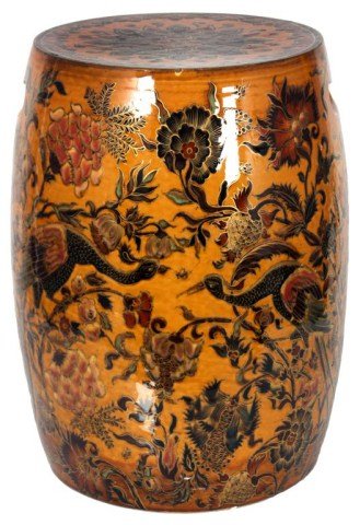 Zsolnay Pottery Garden Stool: Zsolnay Pottery Garden Stool. The barrel shaped stool has cutout handles on the sides, has an orange rust background with oriental pheasants and flowers having gilt trim and embellishments. Stool is s
