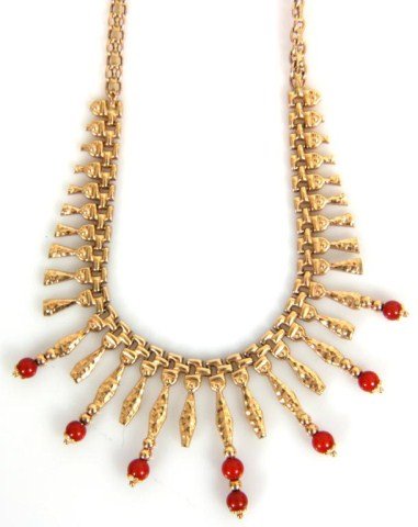 14K Gold & Coral Necklace: 14K Gold & Coral Necklace. Complex Italian chain with hanging lower pendent links having a hammered surface, 7 containing round coral beads. Marked 585, Italy, 17 in. long. Total weight 0.51 oz