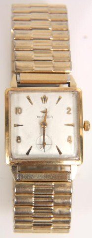 Hamilton 22 Jewel 14K Watch: Hamilton 22 Jewel 14K Gold Watch. Mens wrist watch with marked 14K gold case, has a 22 Jewel movement No. 770, signed Hamiliton and dial signed. Has an elastic stainless and gold filled band, signed S