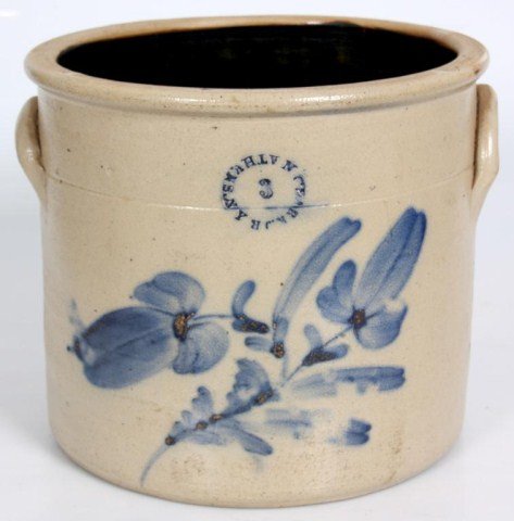 3 Gallon Stoneware Cobalt Crock: Signed N. Clark Jr. Athens, Ny; decorated with a larger branch with flowers and leaves. 3 Gallon, 10 in. high x 11 in. dia. Hairline in rim.