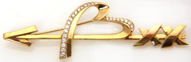 Tiffany & Co. Gold Pin - Paloma Picasso: Tiffany & Co. Diamond Heart Pin by Paloma Picasso . Lady's 18 karat yellow gold & diamond Tiffany & Co. heart pin by Paloma Picasso. The pin contains twenty six (26) round brilliant diamonds of gradua
