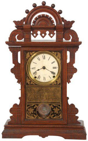 Seth Thomas Eclipse Mantle Clock: Seth Thomas Eclipse Mantle Clock. 5 in. paper dial with black Roman hour numerals, brass bezel, spade hands; brass 8 day spring driven movement No. 5 7/8, signed – S. Thomas, Thomaston, Conn. U.S.A.