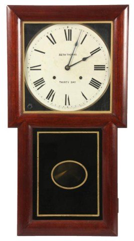 Seth Thomas Wall Regulator – Litchfield: Seth Thomas Wall Regulator – Litchfield. 12 in. painted metal dial, has black Roman hour numerals, signed - Seth Thomas, Thirty Day – has some inpainting over flaking to the dial, brass bezel & bl