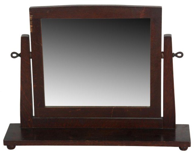 Gustav Stickley Table Mirror: Gustav Stickley Table Mirror. Original rectangular mirror with arched crest, has tapered support arms with iron hardware and a long rectangular base on spherical feet. Signed with branded mark on the 