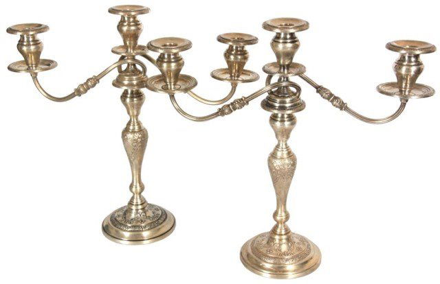 Pr. Whiting Sterling Candelabras: Pr. Whiting Sterling Candelabras. Hand chased design around the base and inverted teardrop stem, decorated with swirling leaf and floral design with removable candle holder at the top and 2 serpentine