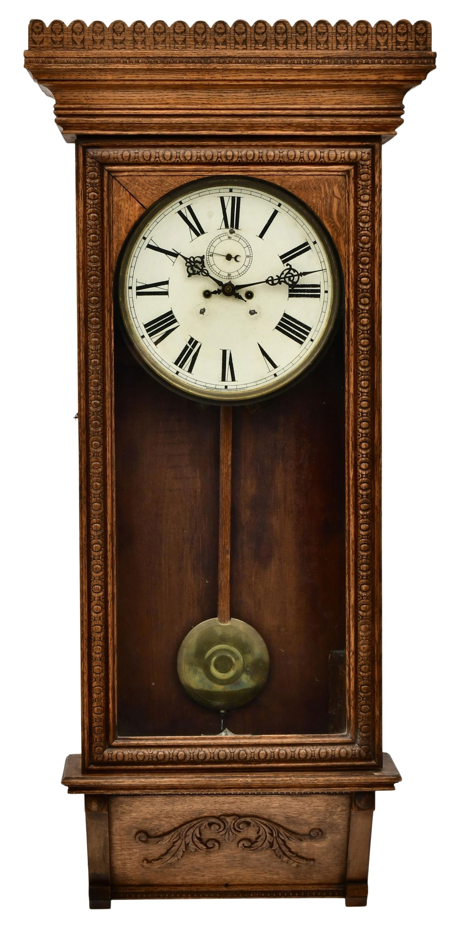 Waterbury Clock Co. Regulator No. 67 Wall Clock: Waterbury Clock Co. Regulator No. 67 Wall Clockcirca 1906pressed oak case, trapezoidal brass 8-day time only weight driven movement with deadbeat escapement, movement and dial signed by the maker50 x