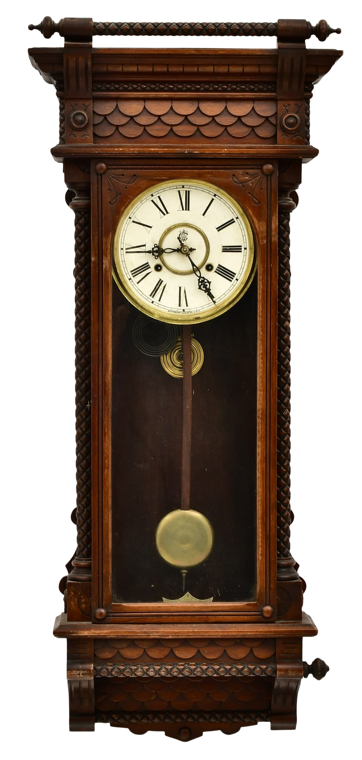 Waterbury Clock Co. "Victoria" Wall Clock: Waterbury Clock Co. "Victoria" Wall Clockcirca 1893walnut case, 8-day brass time and strike spring driven movement, signed on the dial with the firm's mark41 x 17 x 6 1/2 inchesProvenance: P