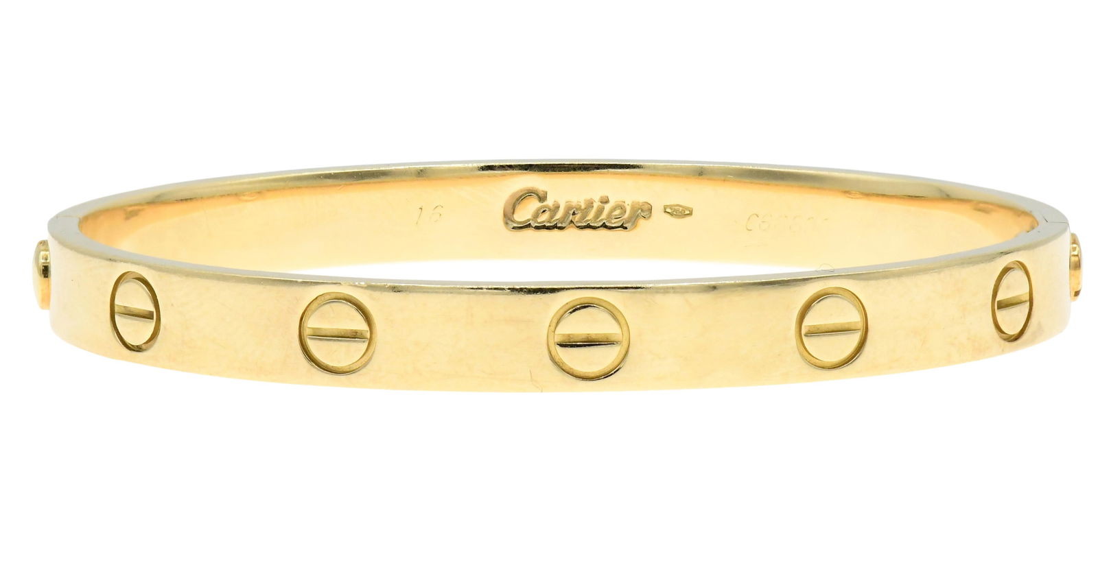 18K Yellow Gold Cartier "Love" Bracelet: 18K Yellow Gold Cartier "Love" Braceletï No. C66606ï 6 inches (internal circumference)ï 2 1/4 x 1 7/8 x 1/4 inchesï 16.5 dwt (total bracelet weight)Other Notes: Fontaine's Auction Gallery can arra