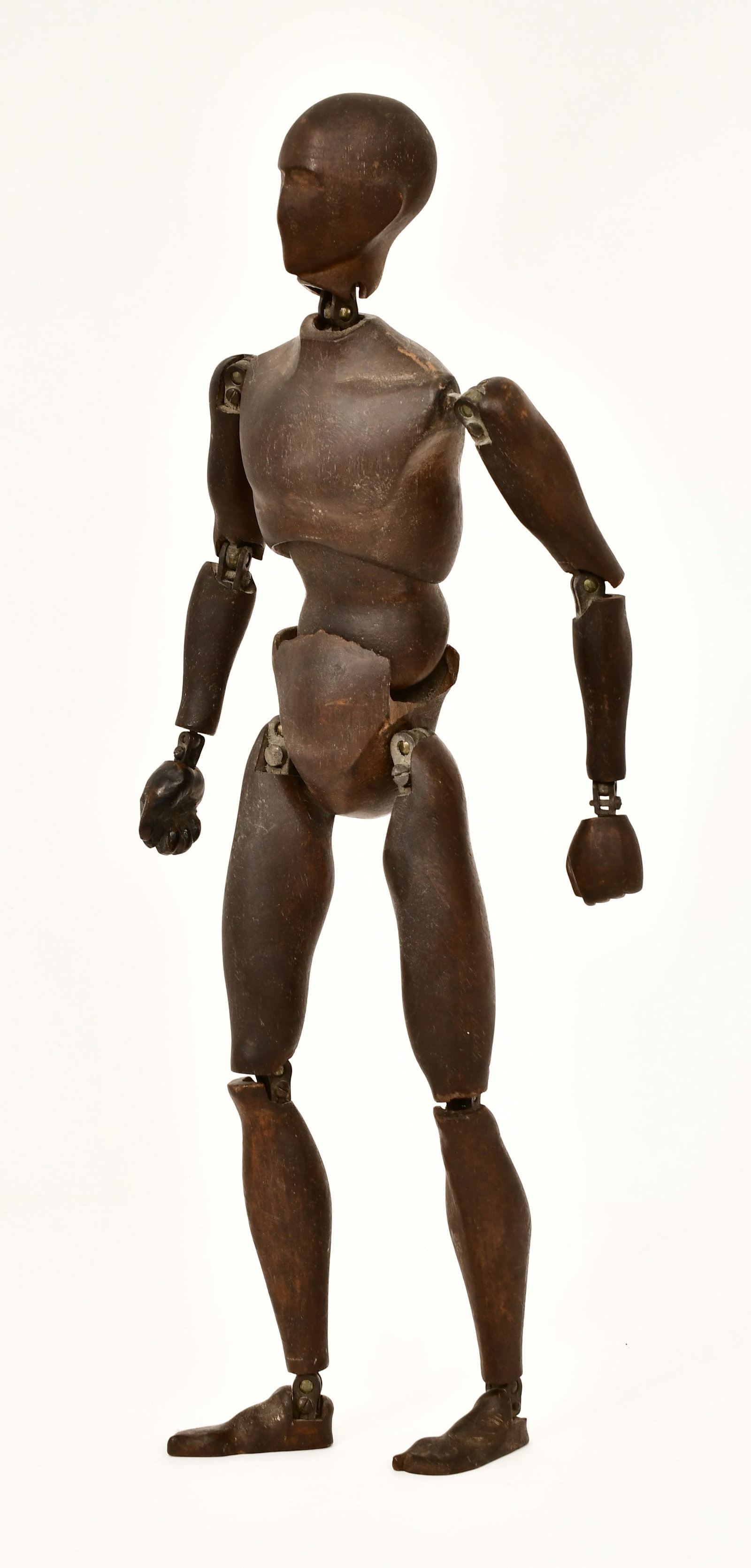 A French "Maquette Francaise" Walnut Artist's Lay Figure: A French "Maquette Francaise" Walnut Artist's Lay Figure 19th century stamped "Maquette Francaise sur Armature Articulee / Brevetee S.G.D.G / Paris B" 20 1/4 x 5 x 2 1/2 inches Pro