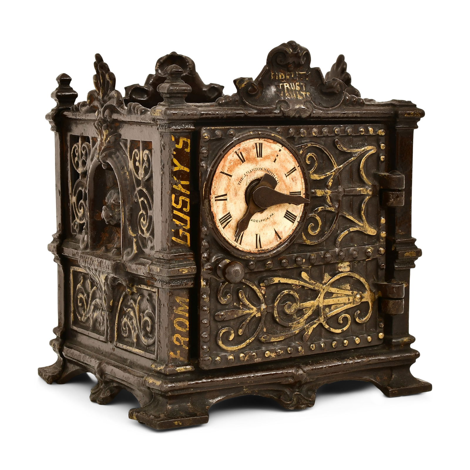 Cast Iron Fidelity Trust Vault/Still Bank by The J. Barton Smith Co.: Cast Iron Fidelity Trust Vault/Still Bank by The J. Barton Smith Co.circa 1890marked "The J. Barton Smith Co., Philadelphia, PA / Fidelity Trust Vaults"6 1/2 x 6 x 5 1/2Other Notes: Fontaine