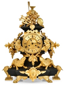 A French Gilt Bronze-Mounted Black Marble Mantel Clock