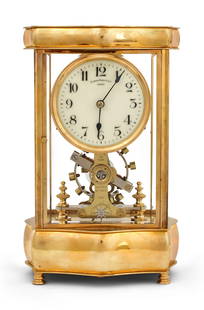 Eureka Clock Co. Ltd. Electro-Mechanical Crystal Regulator Clock: Eureka Clock Co. Ltd. Electro-Mechanical Crystal Regulator Clockcirca 1906brass case with beveled glass, electro-mechanical battery powered balance wheel escapement, dial marked "Eureka Clock Co.