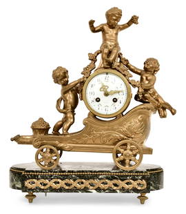 French Gilt Bronze & Marble Chariot Mantel Clock: French Gilt Bronze & Marble Chariot Mantel Clockcirca 1880the case decorated as a chariot with three cherubs, the porcelain dial with fancy gilt hands and Arabic hour numerals, brass 8-day striking mo