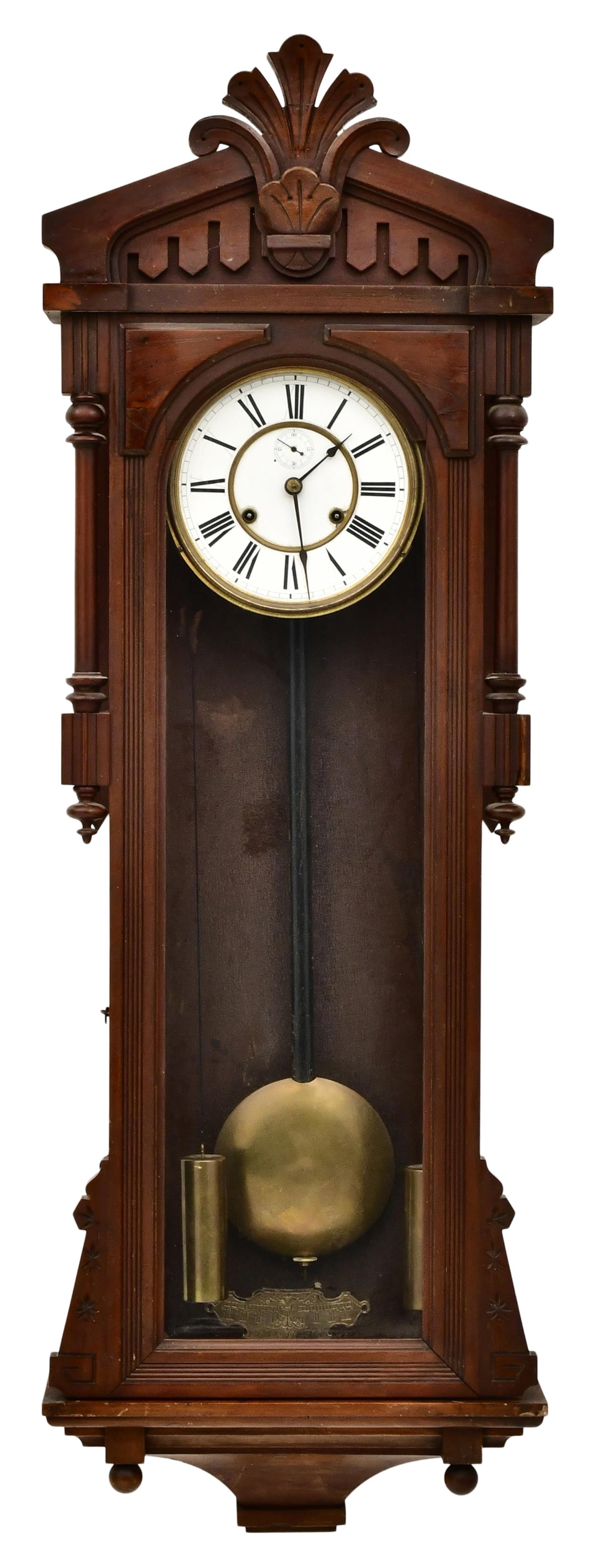 Ansonia Clock Co. "Bagdad" Wall Clock: Ansonia Clock Co. "Bagdad" Wall Clockcirca 1895walnut case with Eastlake style trim, 8-day two weight driven time only nickel-plated brass movement, signed on the beat regulator49 x 16 x 6 i