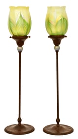 Tiffany Studios, A Pair of "Jeweled" Candlesticks with "Pulled Feather" Shades
