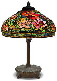Tiffany Studios, An Early "Peony" Table Lamp: Tiffany StudiosAn Early "Peony" Table Lampcirca 1903leaded glass, patinated bronzeshade with a small and early tag "Tiffany Studios, New York"base impressed "Tiffany Studios, New York, 28620" and with